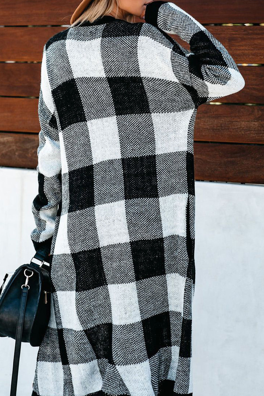 A stylish Board Games Pocketed Checkered Cardigan featuring a monochrome plaid print, open front design, and cozy fabric, perfect for chilly weather.