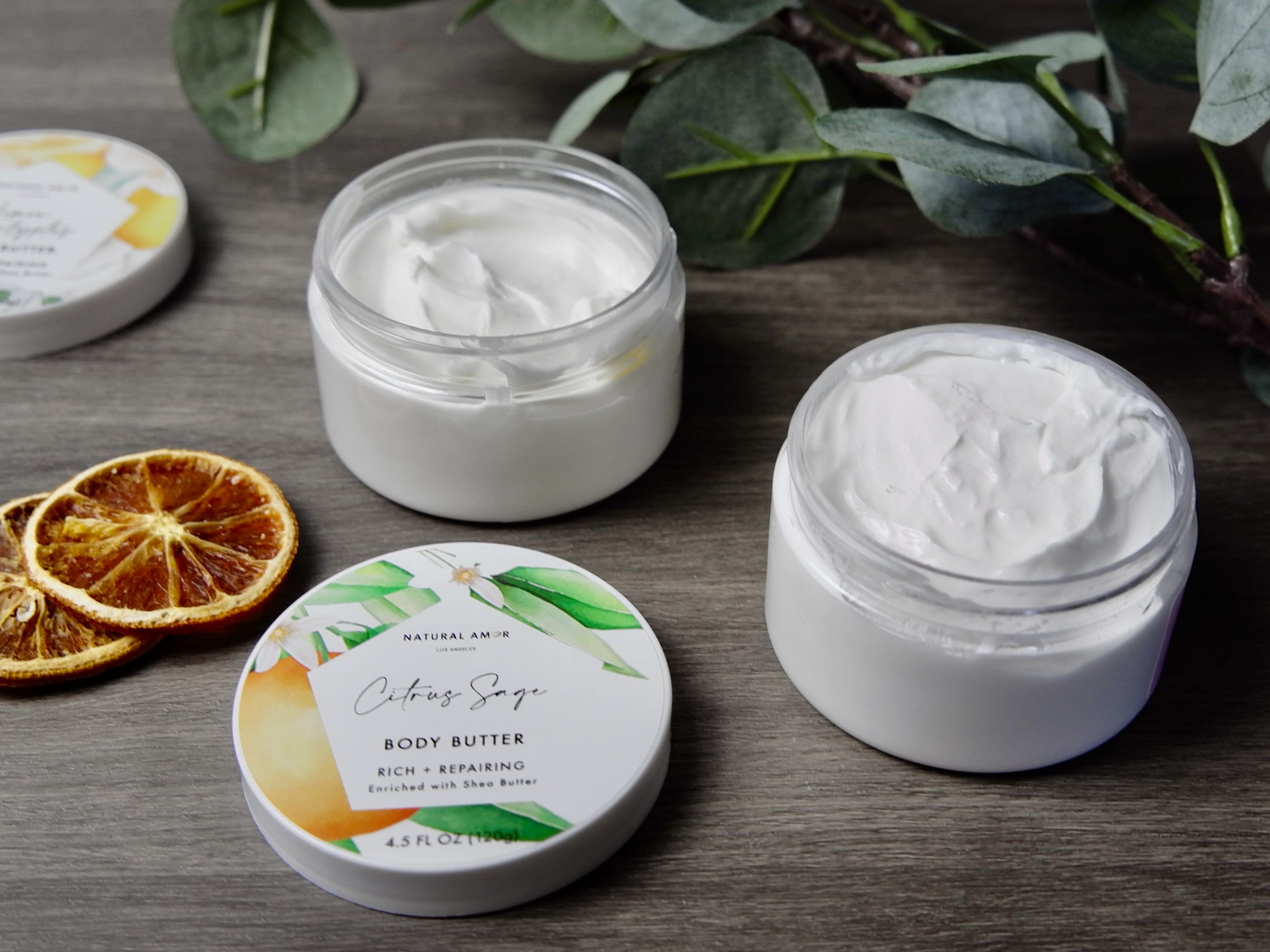 Body Butter Trio Gift Set featuring three 4oz jars in a beautifully designed gift box, showcasing Lavender Eucalyptus, Citrus Sage, and Rose Cedarwood scents.