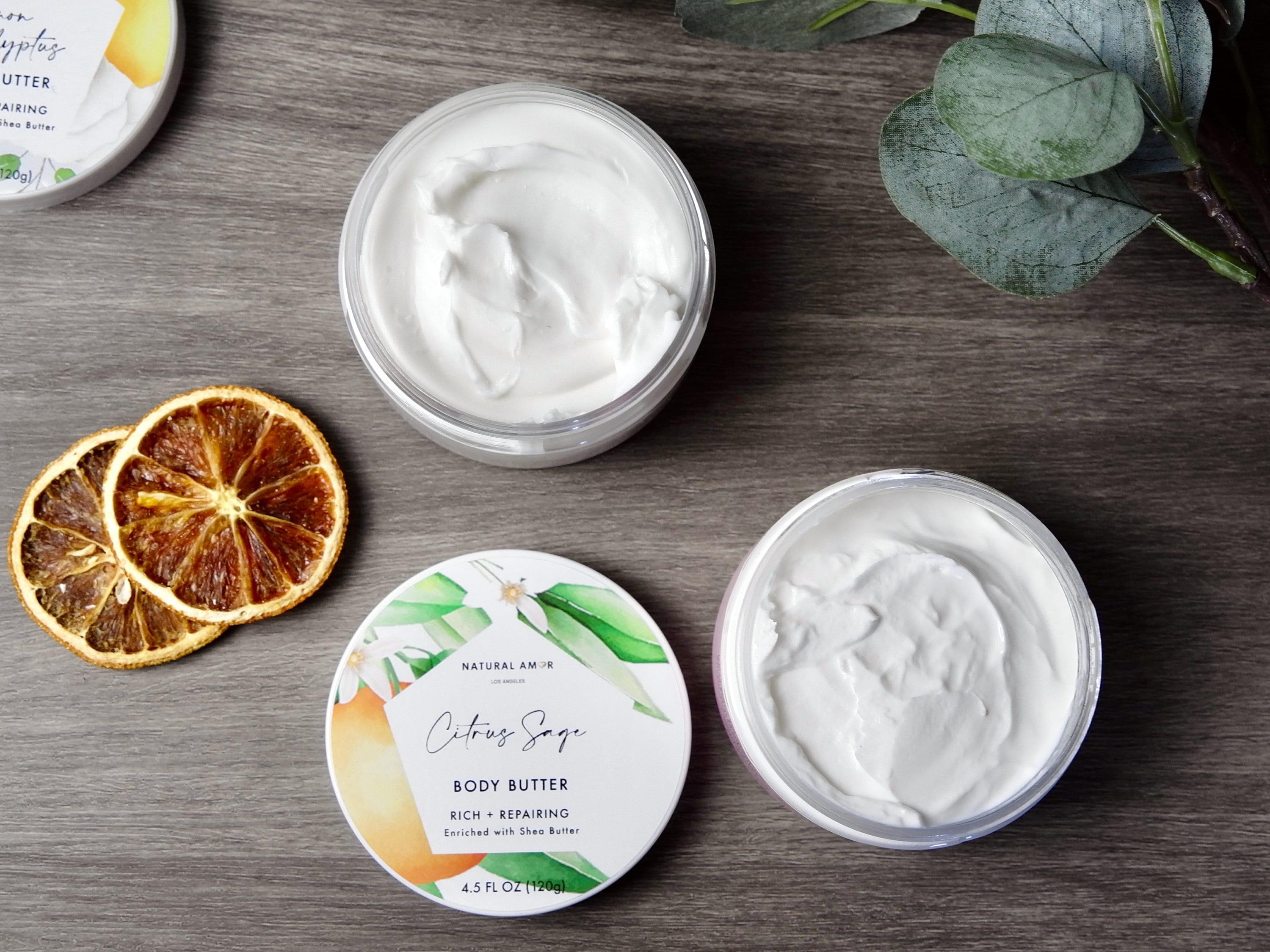 Body Butter Trio Gift Set featuring three 4oz jars in a beautifully designed gift box, showcasing Lavender Eucalyptus, Citrus Sage, and Rose Cedarwood scents.