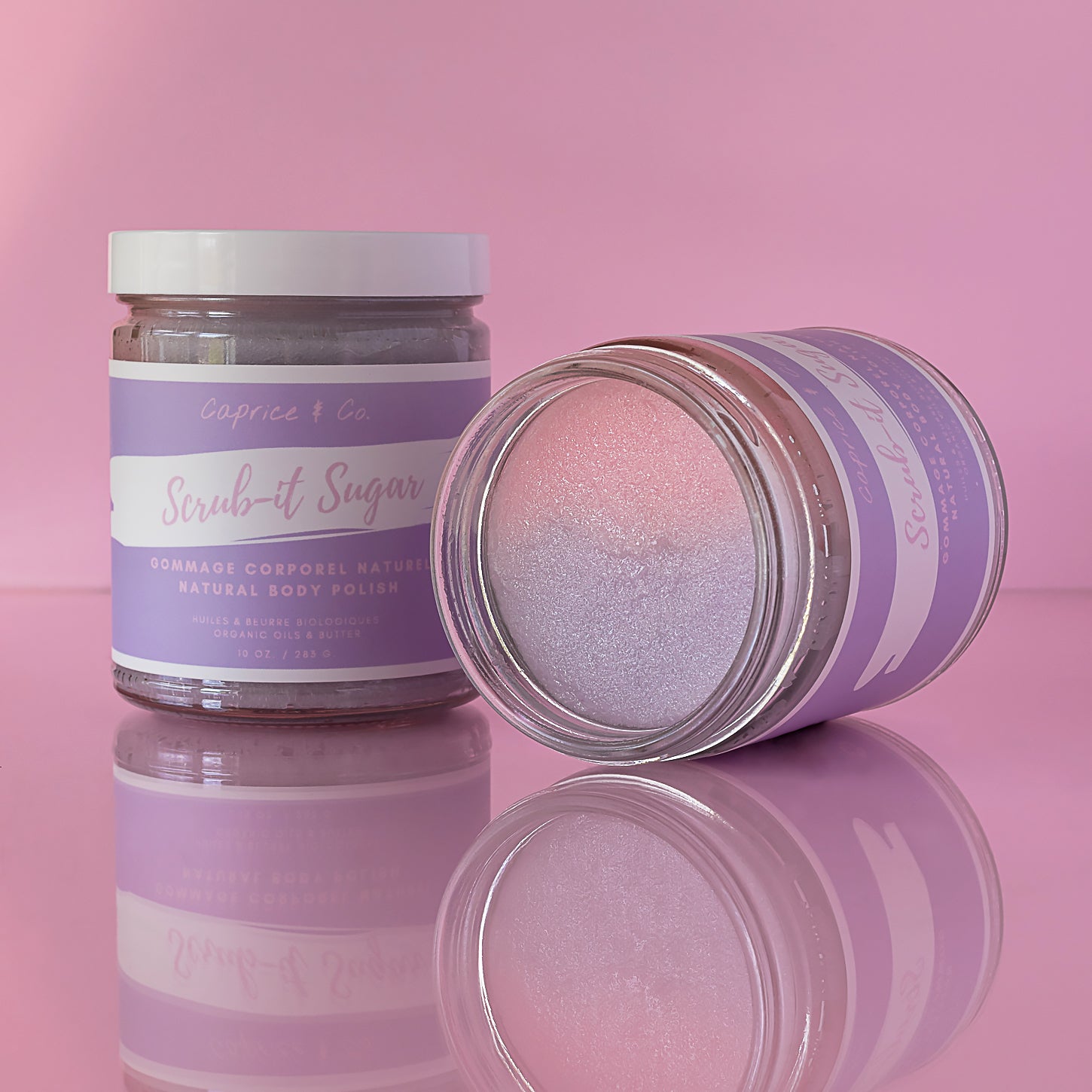 A vibrant pink jar of Bubblegum Body Scrub with a label, showcasing its natural ingredients and sweet scent.