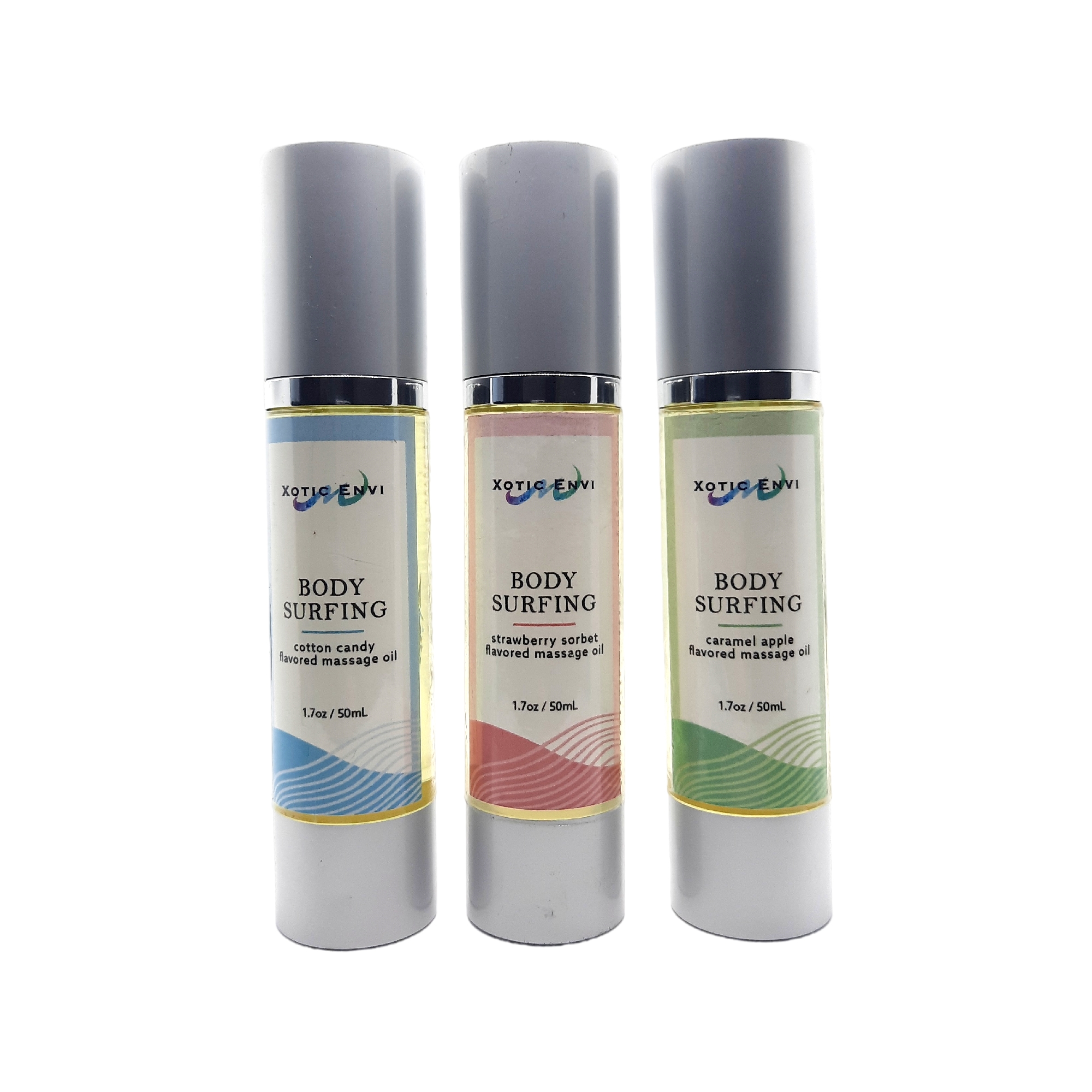 Body Surfing Massage Oil Bundle featuring three flavors: Caramel Apple, Strawberry Sorbet, and Cotton Candy, in elegant packaging.