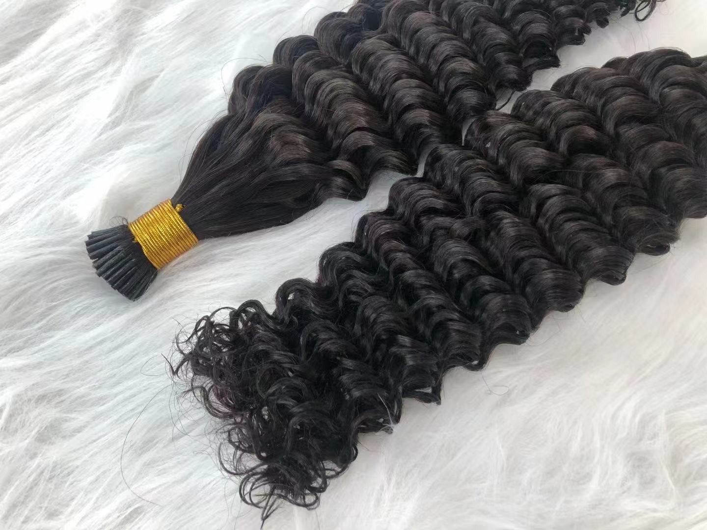 Brazilian Deep Wave Human Hair i Tip Microlinks in natural black color, showcasing deep wave texture and bulk braiding options.