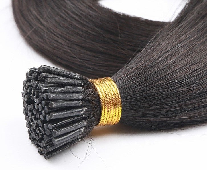 Brazilian Straight Human Hair I Tip Microlinks in natural black color, showcasing its smooth texture and quality for braiding.