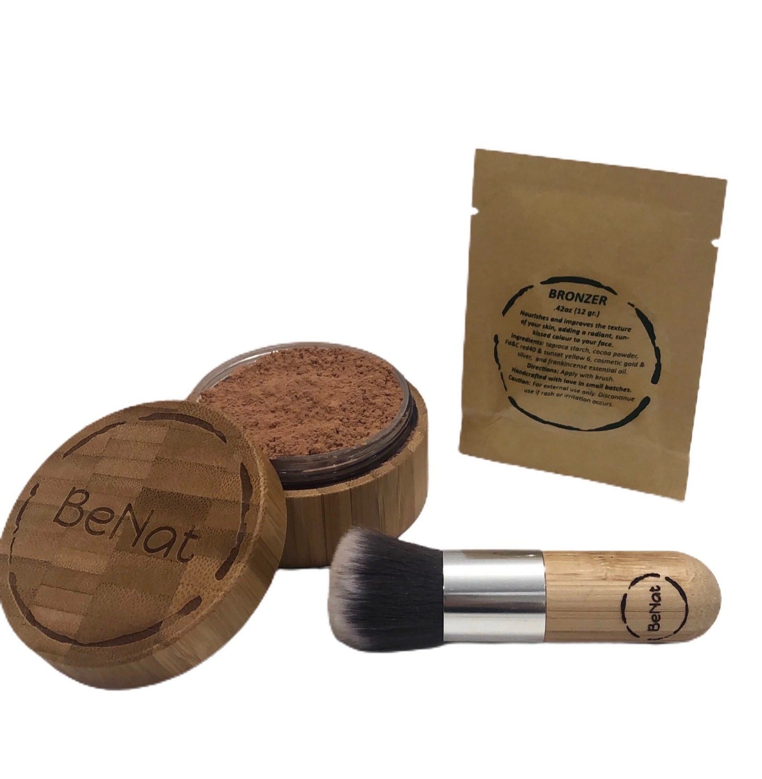 Bronzer Loose Powder Set featuring a bamboo case, refill bag, and kabuki brush, showcasing eco-friendly beauty essentials.