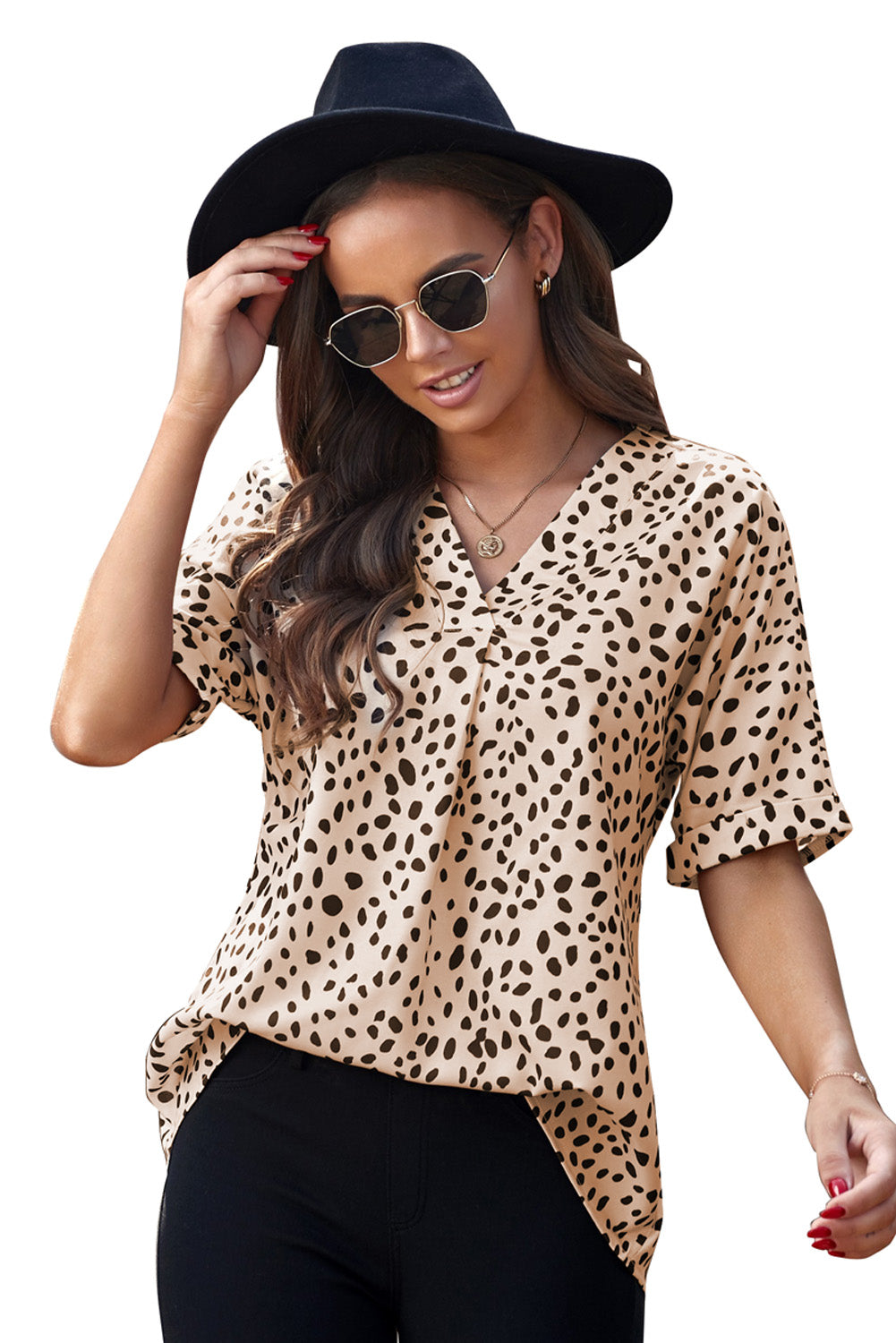 Brown animal print V-neck tunic top with rolled sleeves, showcasing a stylish design and comfortable fit.