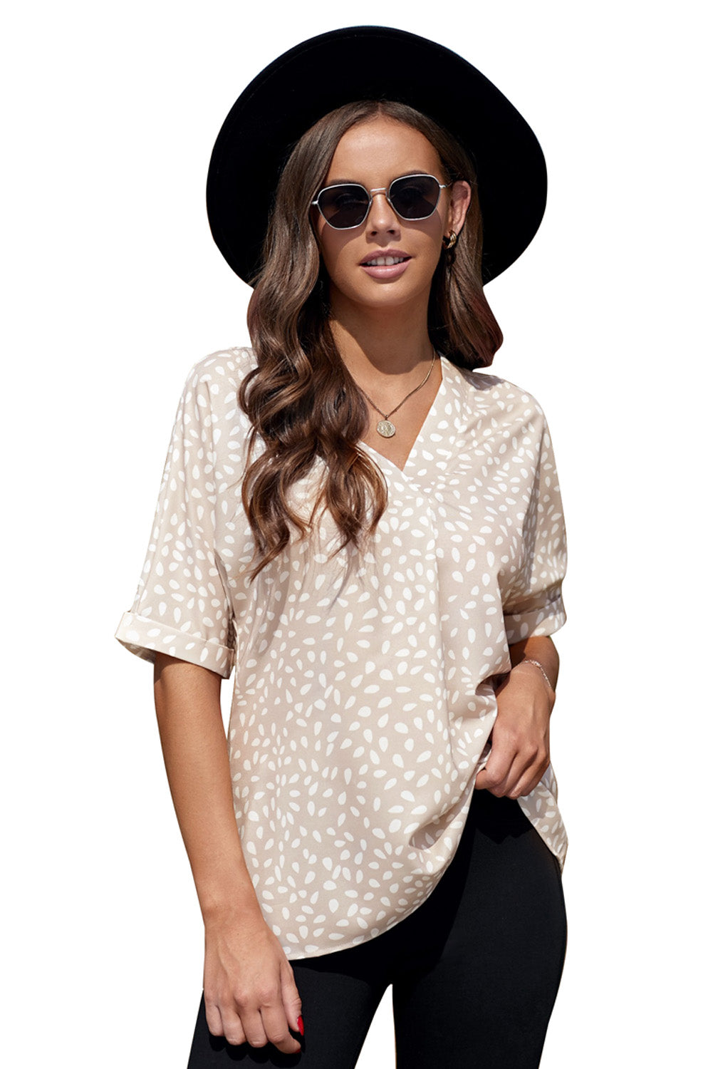 Brown animal print V-neck tunic top with rolled sleeves, showcasing a stylish design and comfortable fit.