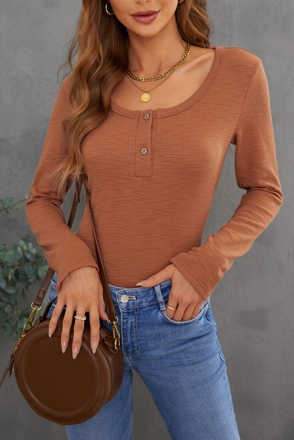 Brown Crewneck Long Sleeve Top with Button Details, showcasing ribbed texture and stylish design.