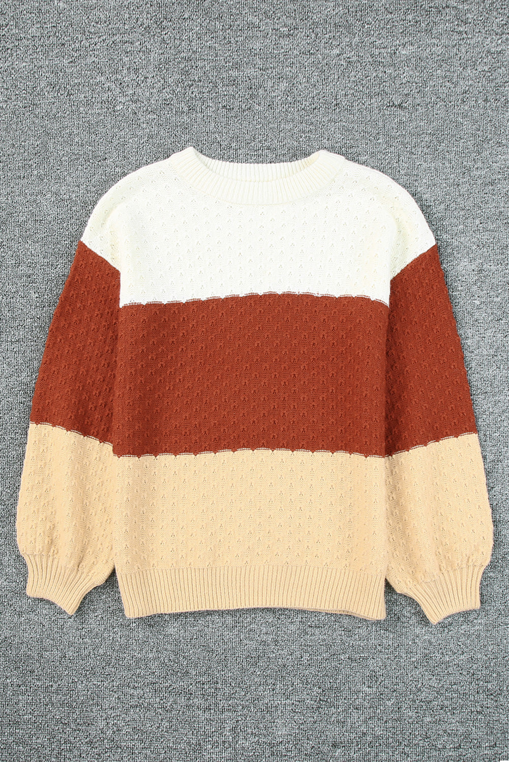 A stylish brown geometric texture colorblock sweater featuring a unique design, perfect for winter wear.