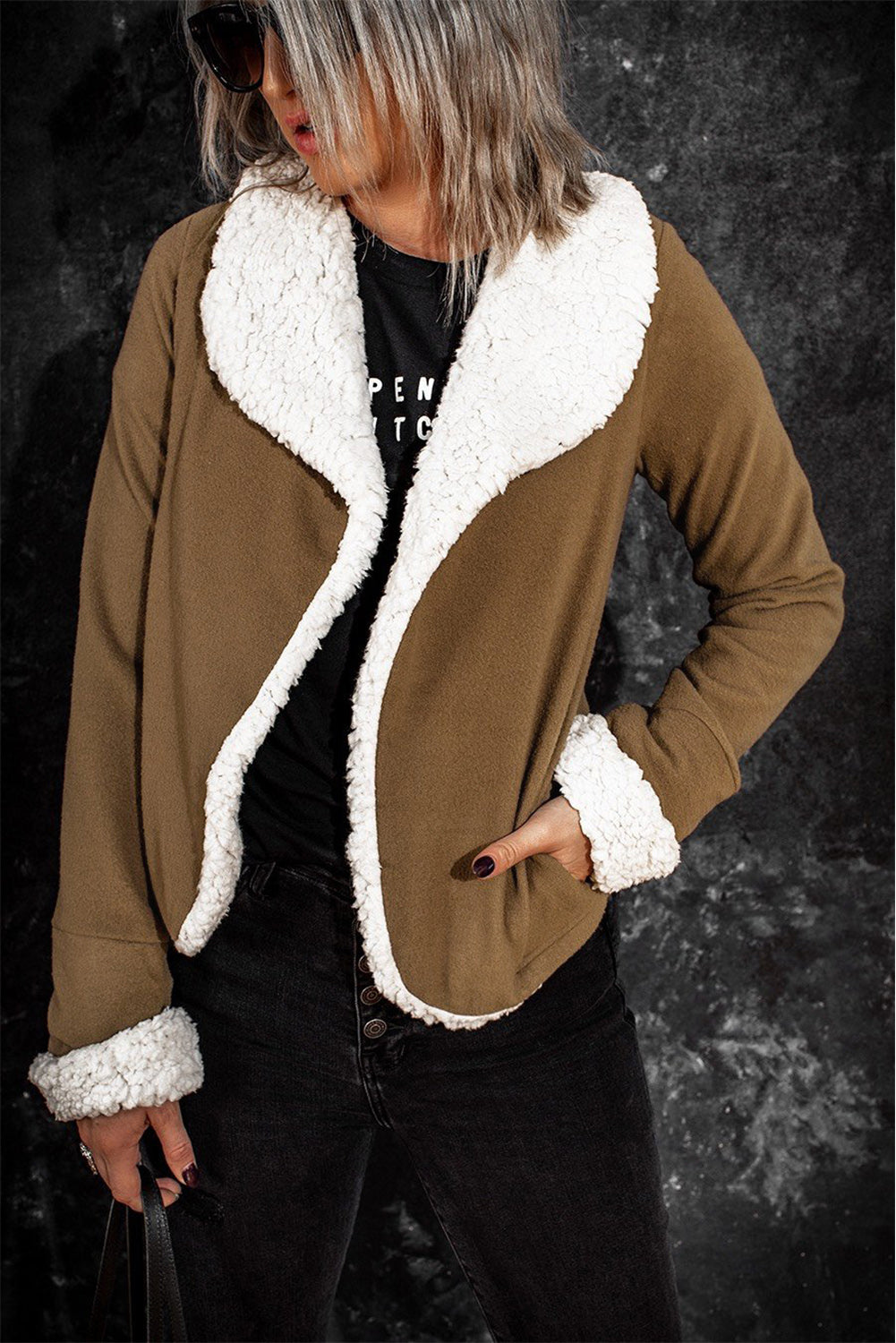 Brown lapel collar fleece open front coat displayed on a mannequin, showcasing its stylish design and warm fleece lining.