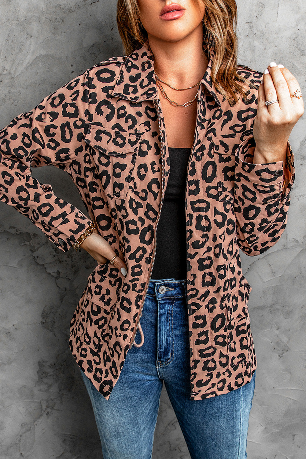 A stylish brown leopard print coat featuring a lapel collar, long sleeves, and a drawstring waist, perfect for fashionable outings.