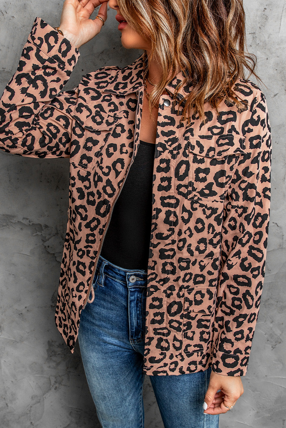 A stylish brown leopard print coat featuring a lapel collar, long sleeves, and a drawstring waist, perfect for fashionable outings.