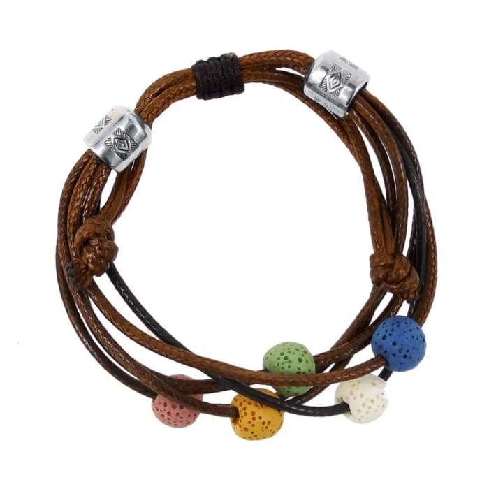 Brown lava stone charm bracelet with adjustable design, showcasing its unique texture and ability to hold essential oils.