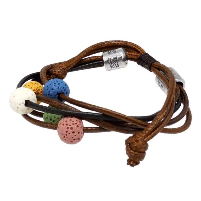 Brown lava stone charm bracelet with adjustable design, showcasing its unique texture and ability to hold essential oils.