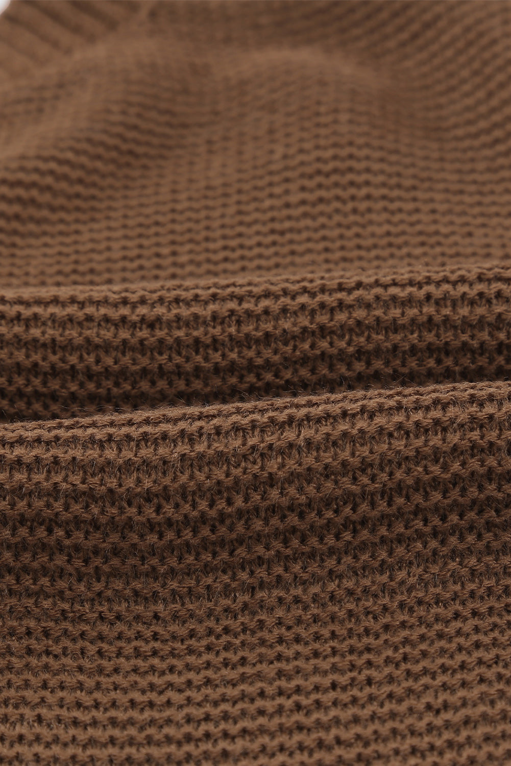 A stylish brown knitted long sleeve sweater featuring color splicing and buttoned design, perfect for casual outfits.