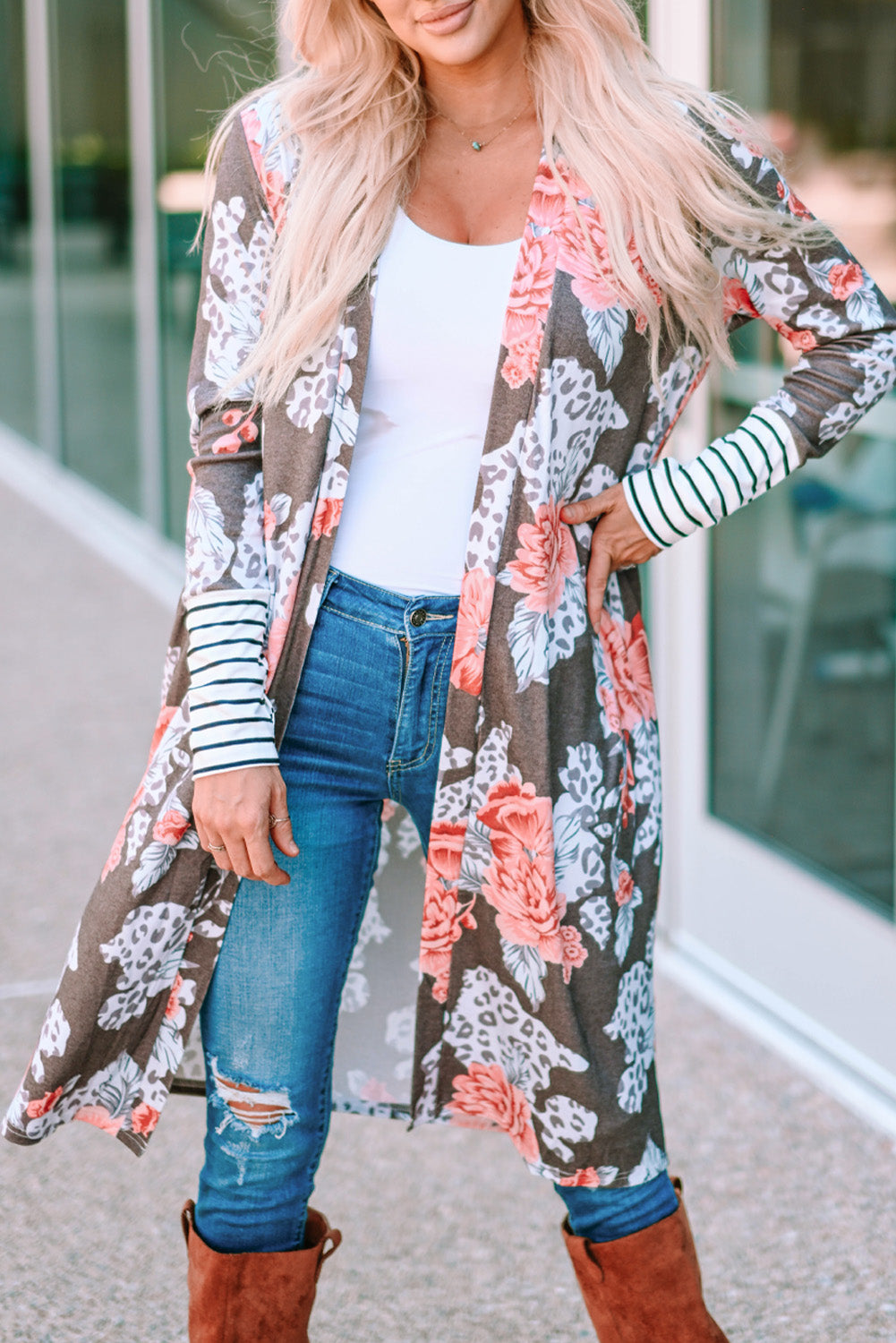 A stylish brown striped cuffs floral print long cardigan featuring a soft knit fabric, relaxed fit, and side pockets.