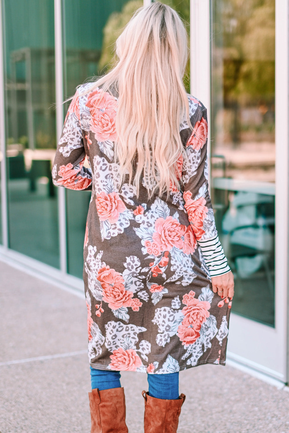 A stylish brown striped cuffs floral print long cardigan featuring a soft knit fabric, relaxed fit, and side pockets.