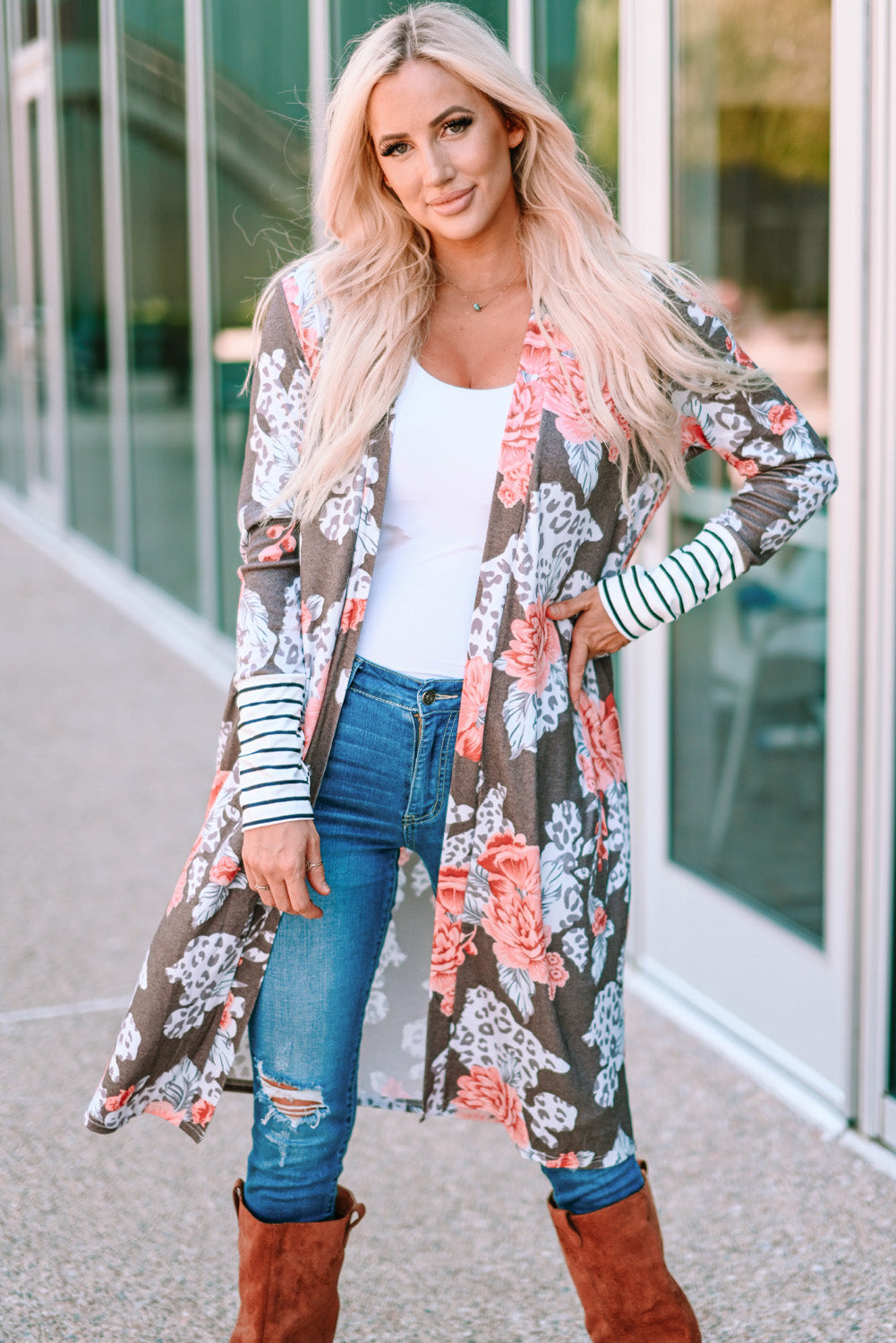 A stylish brown striped cuffs floral print long cardigan featuring a soft knit fabric, relaxed fit, and side pockets.