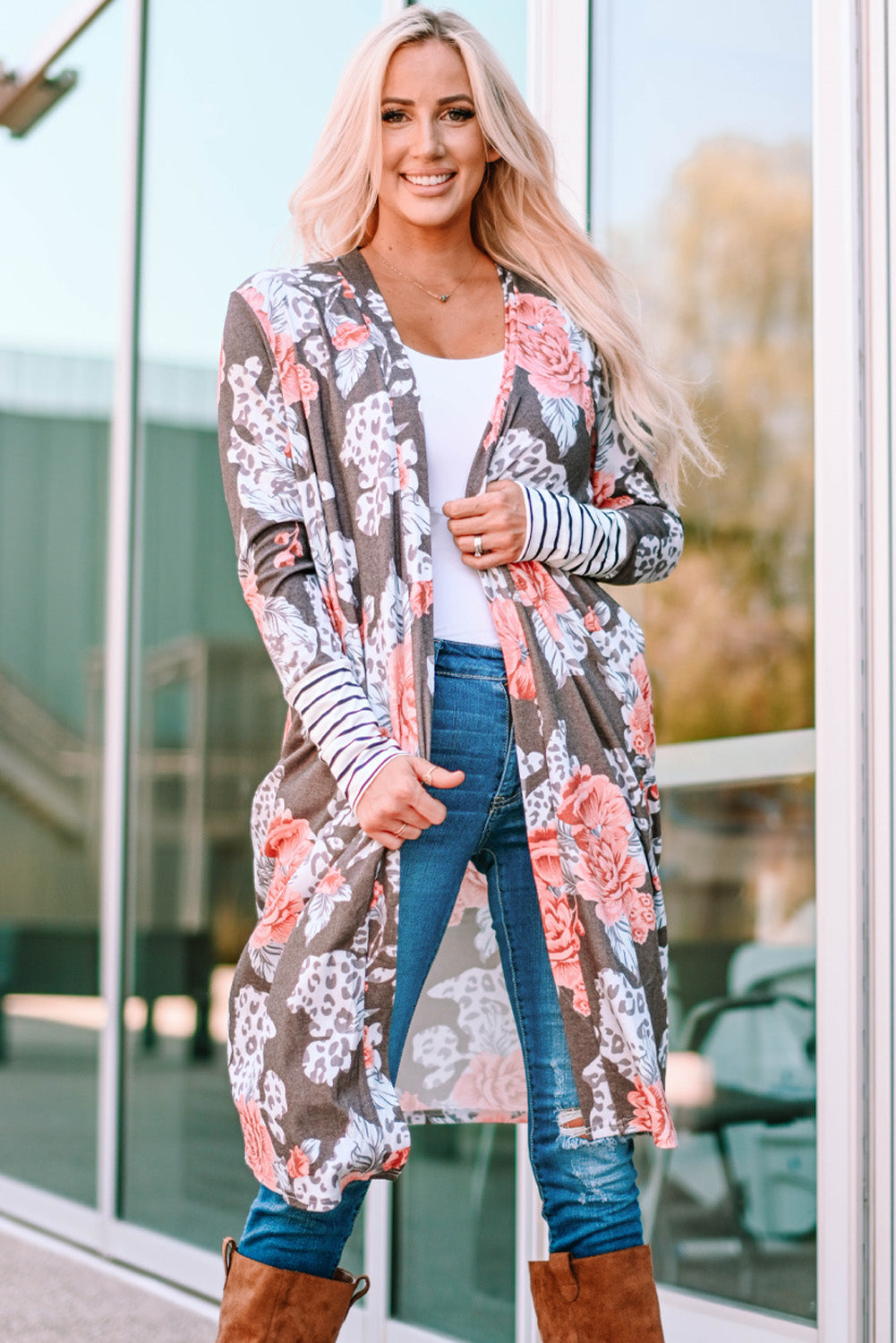 A stylish brown striped cuffs floral print long cardigan featuring a soft knit fabric, relaxed fit, and side pockets.