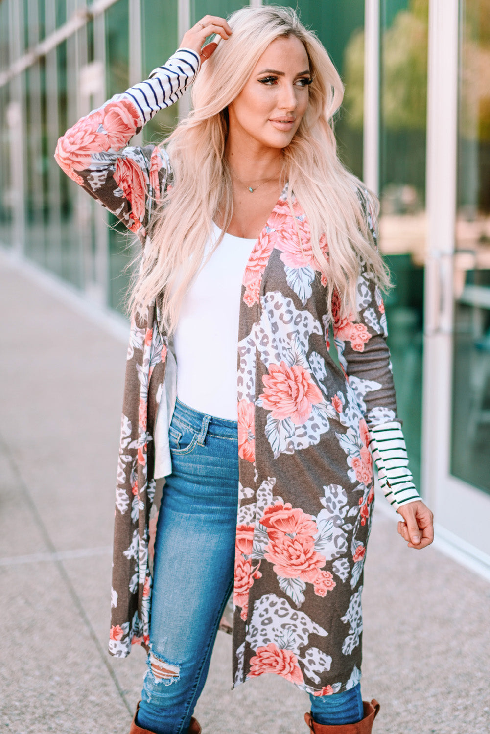 A stylish brown striped cuffs floral print long cardigan featuring a soft knit fabric, relaxed fit, and side pockets.