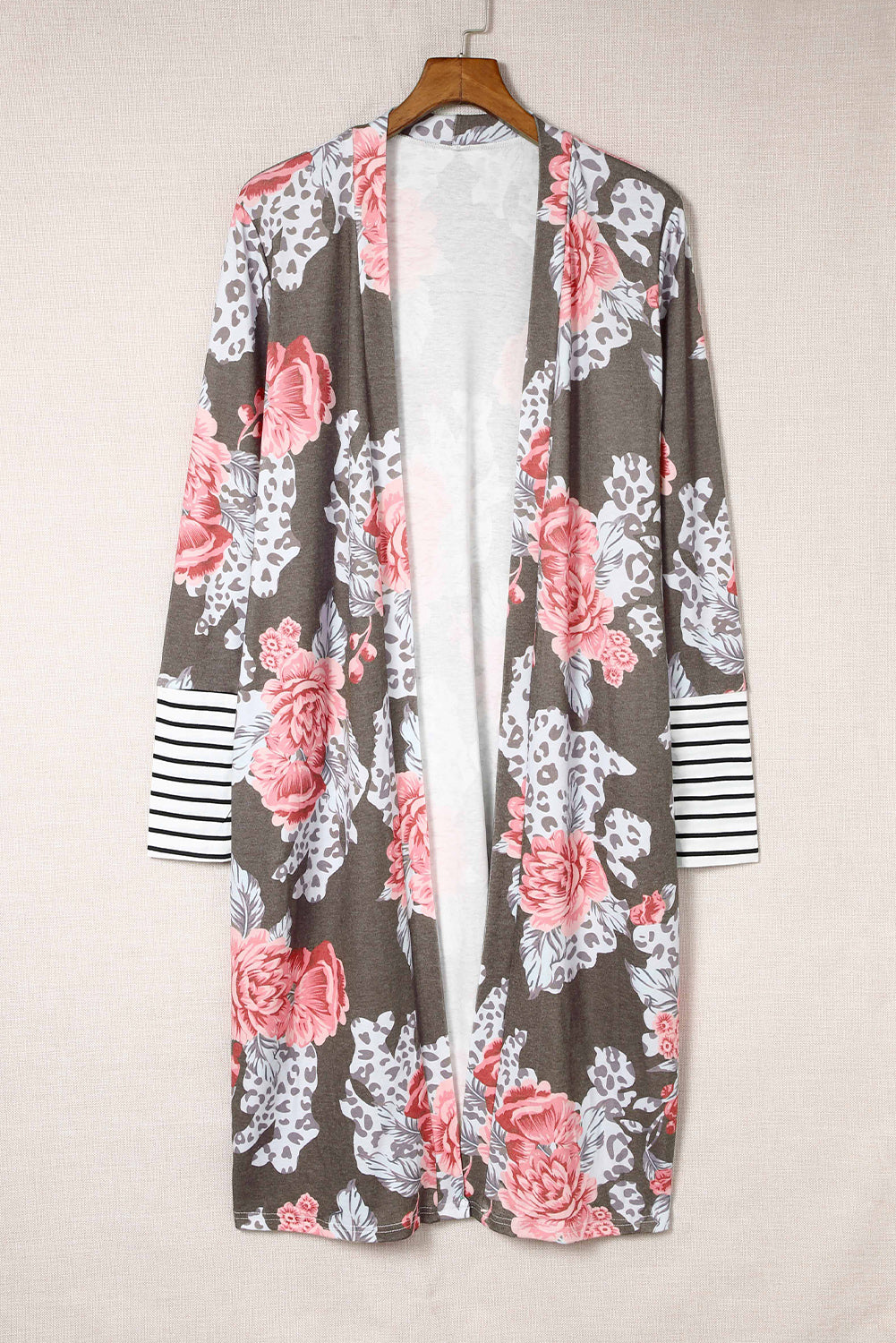 A stylish brown striped cuffs floral print long cardigan featuring a soft knit fabric, relaxed fit, and side pockets.