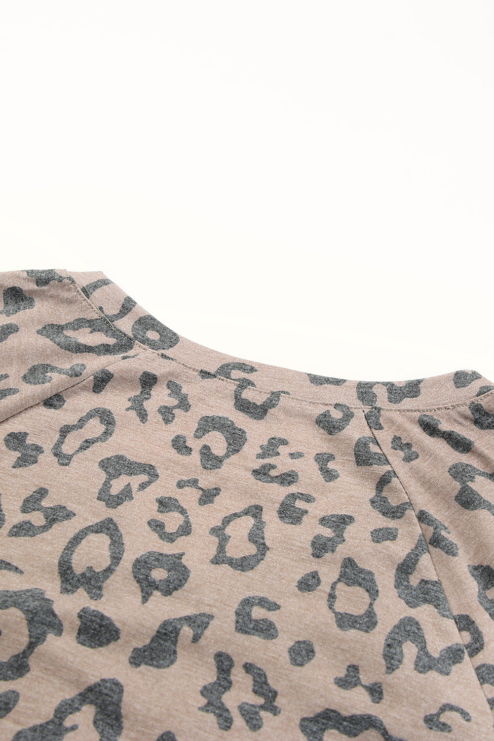 Brown V Neck Front Pocket Leopard Tee featuring a stylish leopard print design, perfect for summer wear.