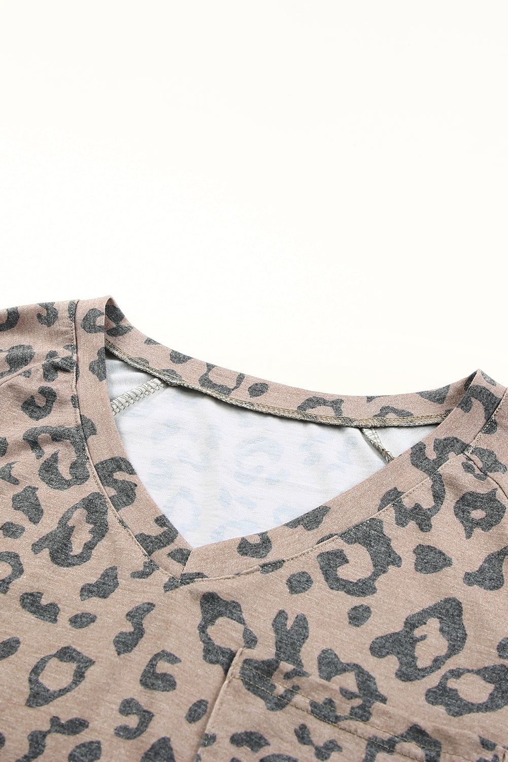 Brown V Neck Front Pocket Leopard Tee featuring a stylish leopard print design, perfect for summer wear.