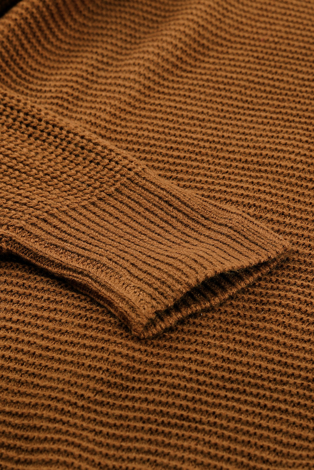 A stylish brown zip knitted high neck sweater displayed on a mannequin, showcasing its soft texture and modern design.