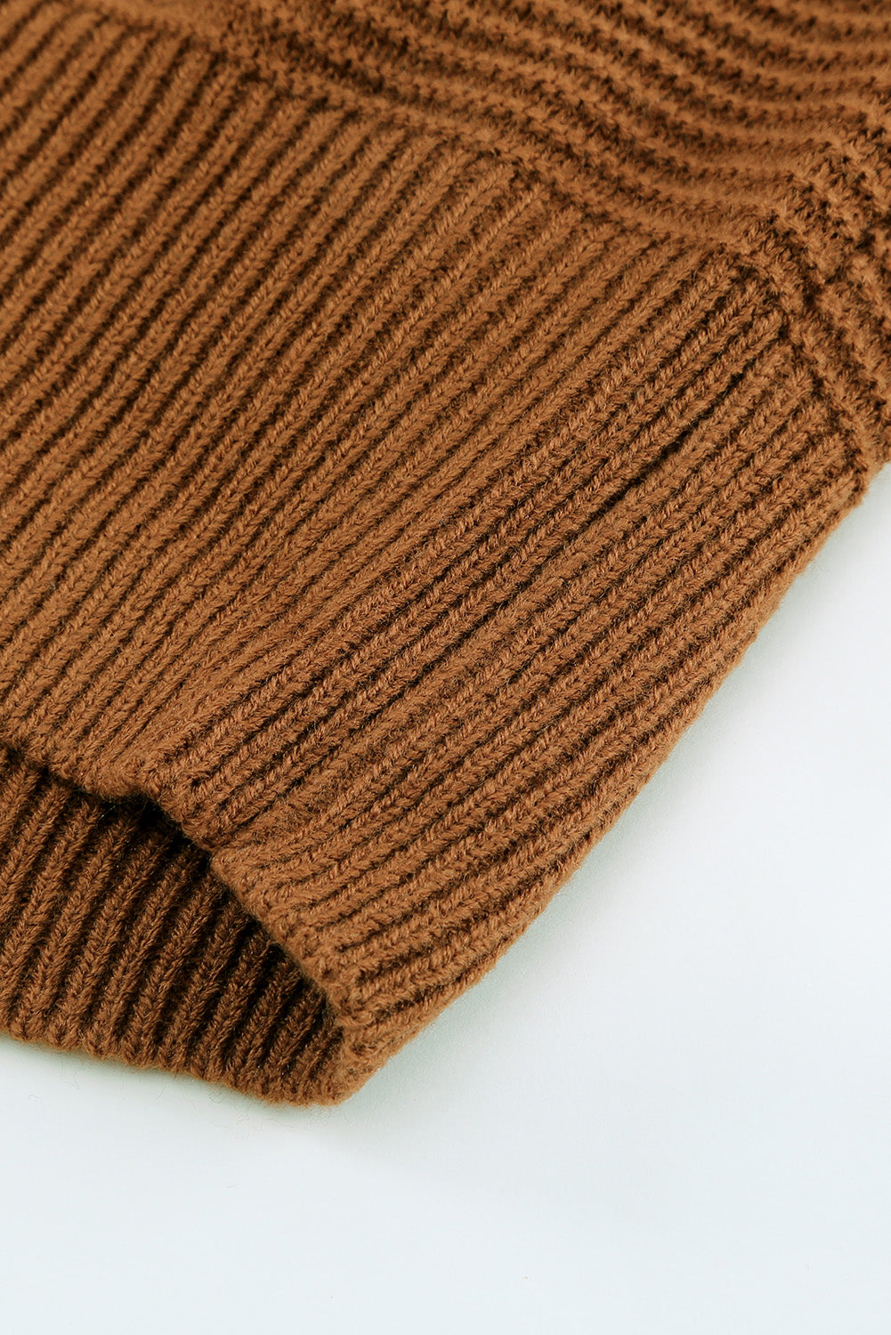 A stylish brown zip knitted high neck sweater displayed on a mannequin, showcasing its soft texture and modern design.