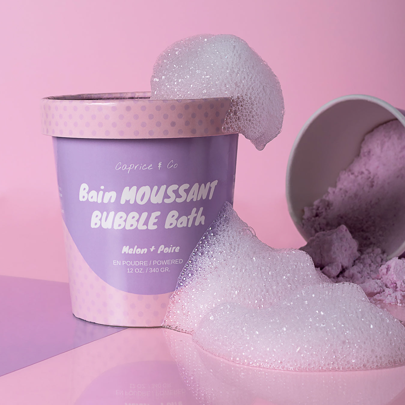 A jar of Powdered Bubble Bath with colorful packaging, showcasing its natural ingredients and delightful scents.