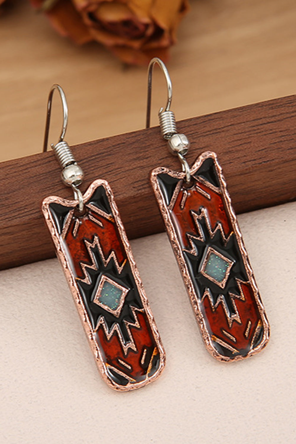 Burgundy Western Aztec Pattern Alloy Dangle Earrings showcasing intricate design and vibrant color.