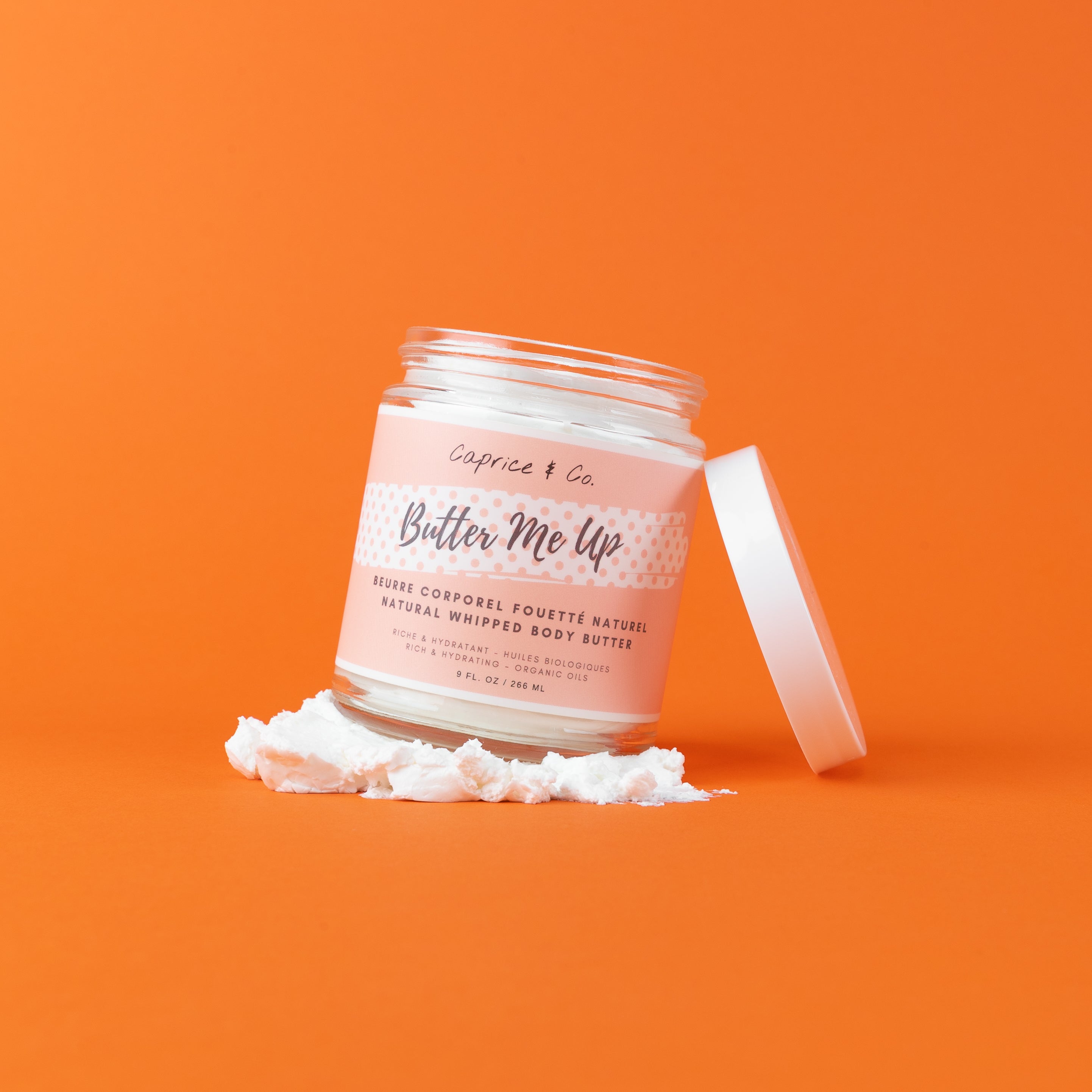 Butter Me Up - White Freesia + Vanilla Natural Whipped Body Butter in a stylish jar, showcasing its creamy texture and elegant packaging.