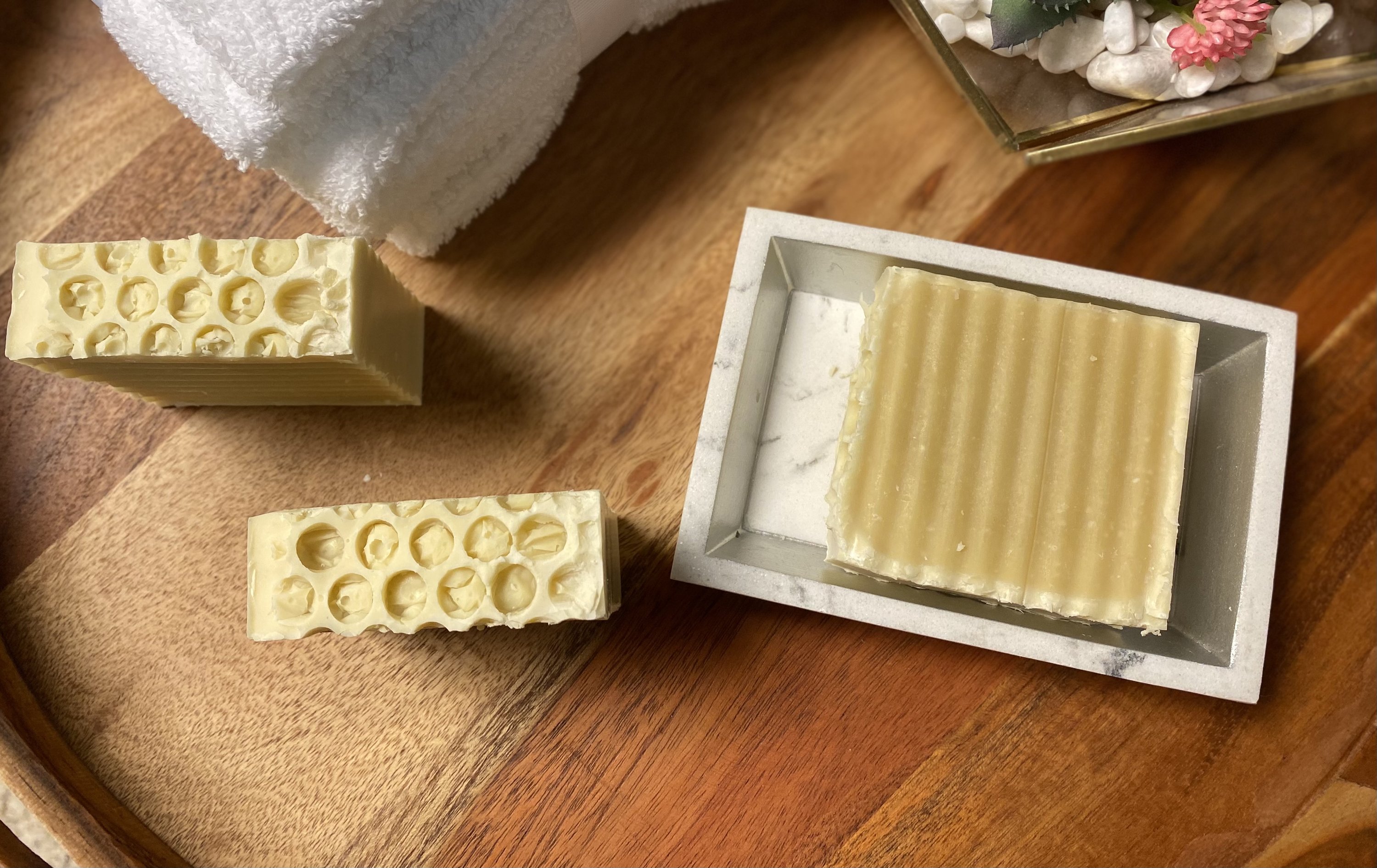 Buttermilk unscented soap bar with creamy texture, showcasing its natural ingredients and luxurious bubbles.