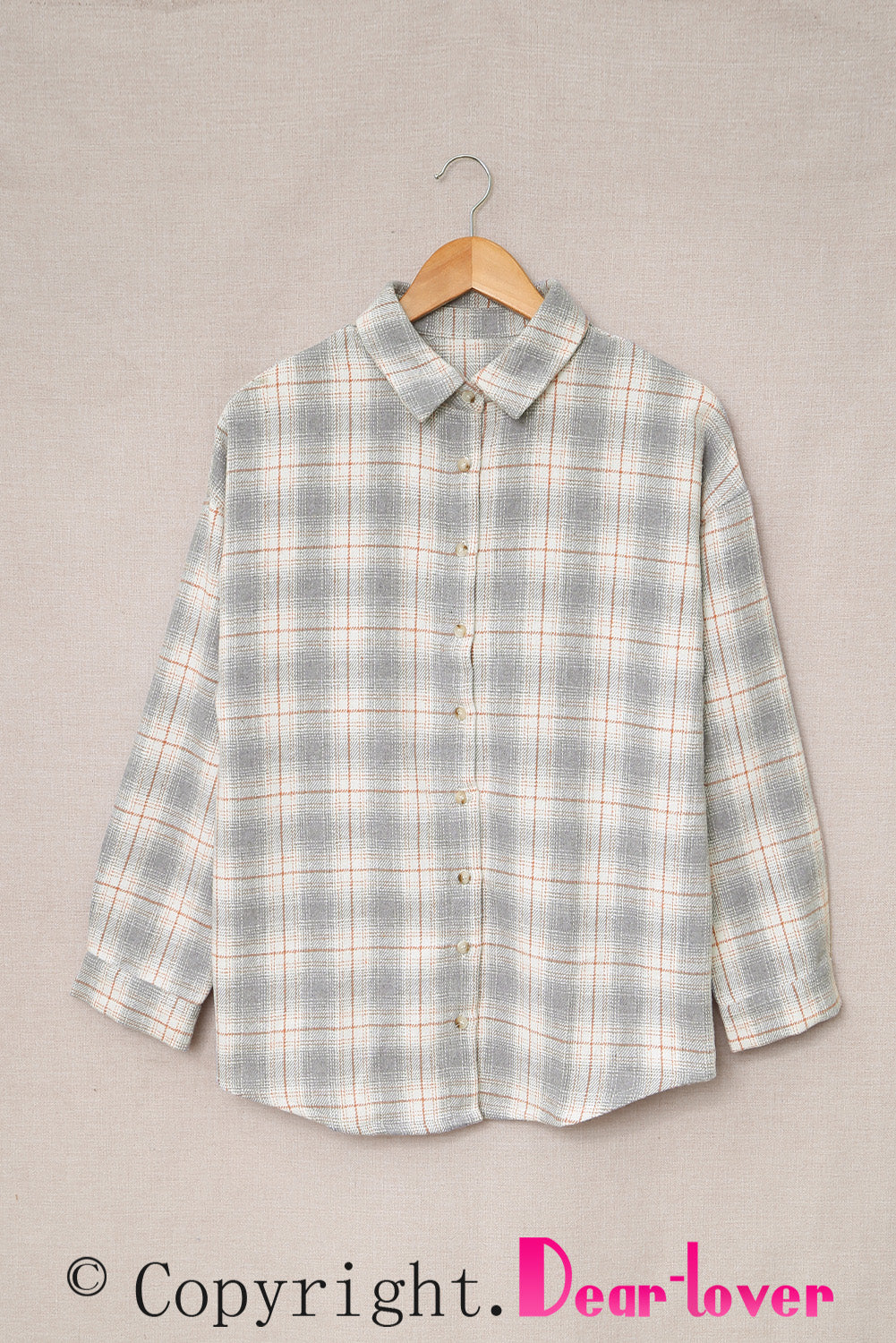 A stylish Buttoned Turn Down Collar Plaid Shirt featuring a slim fit design, classic plaid pattern, and button closure, suitable for ladies and young girls.