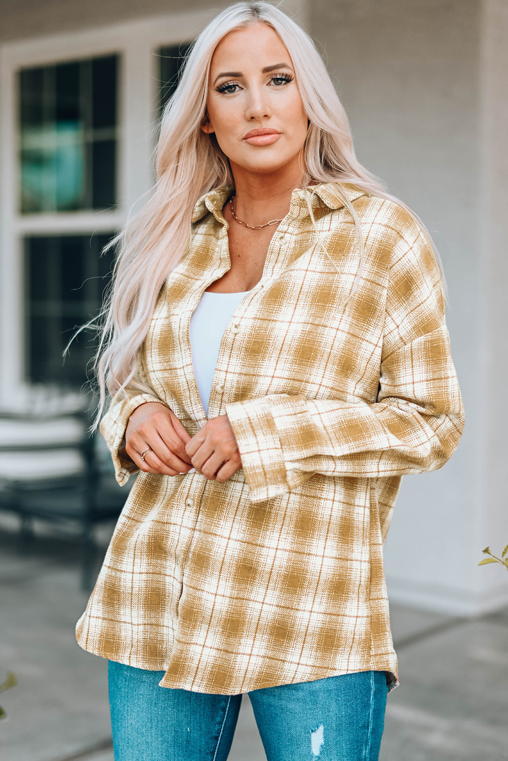 A stylish Buttoned Turn Down Collar Plaid Shirt featuring a slim fit design, classic plaid pattern, and button closure, suitable for ladies and young girls.