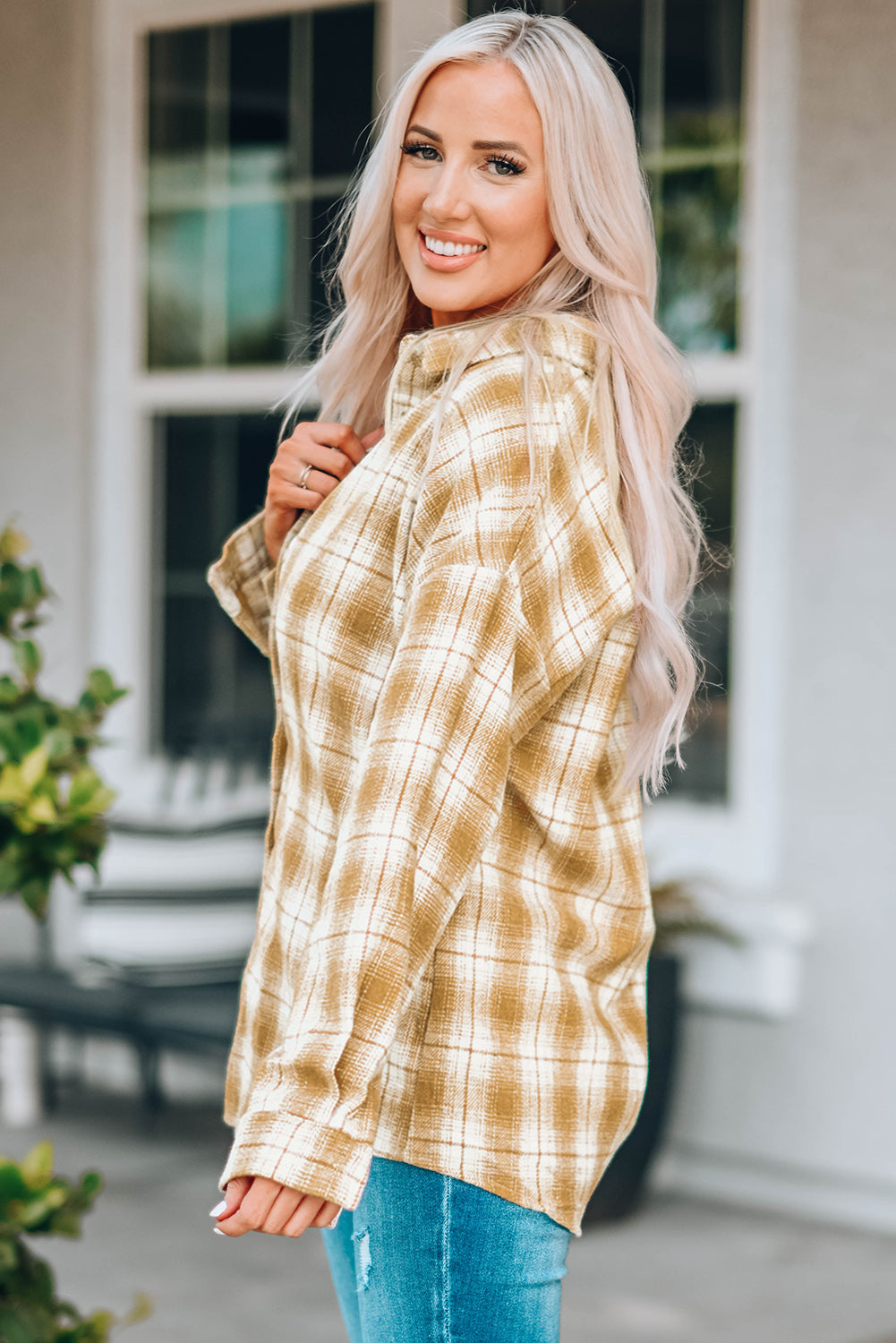 A stylish Buttoned Turn Down Collar Plaid Shirt featuring a slim fit design, classic plaid pattern, and button closure, suitable for ladies and young girls.