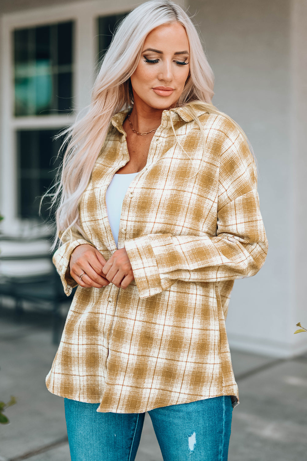 A stylish Buttoned Turn Down Collar Plaid Shirt featuring a slim fit design, classic plaid pattern, and button closure, suitable for ladies and young girls.