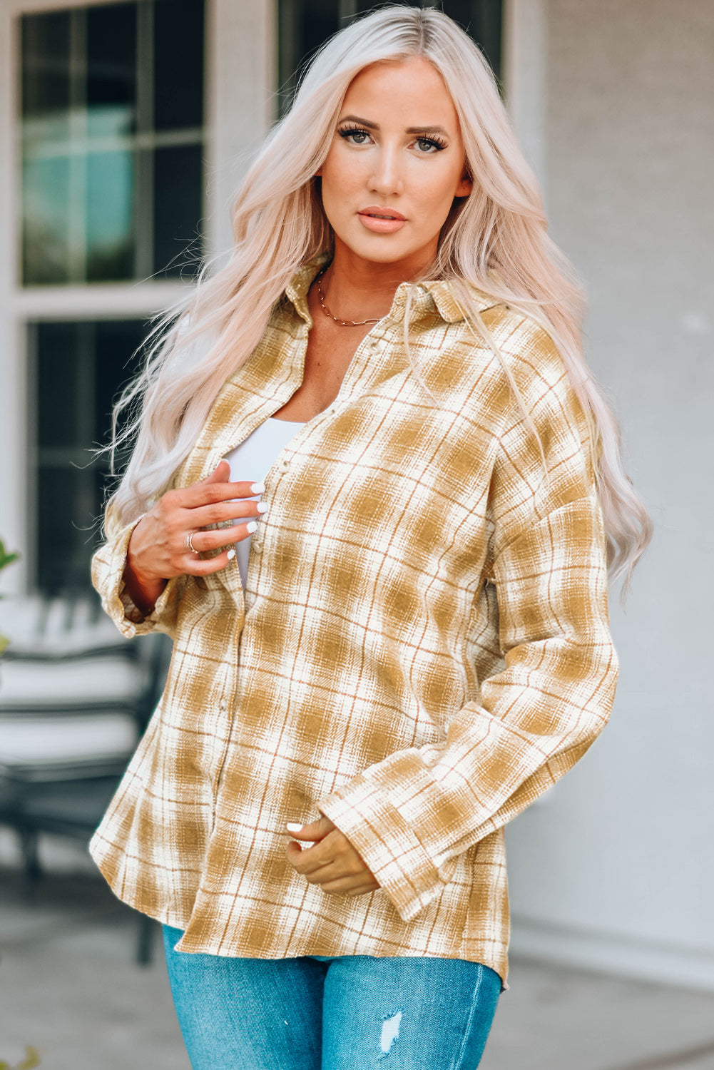 A stylish Buttoned Turn Down Collar Plaid Shirt featuring a slim fit design, classic plaid pattern, and button closure, suitable for ladies and young girls.