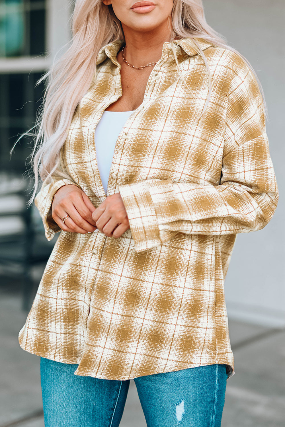 A stylish Buttoned Turn Down Collar Plaid Shirt featuring a slim fit design, classic plaid pattern, and button closure, suitable for ladies and young girls.