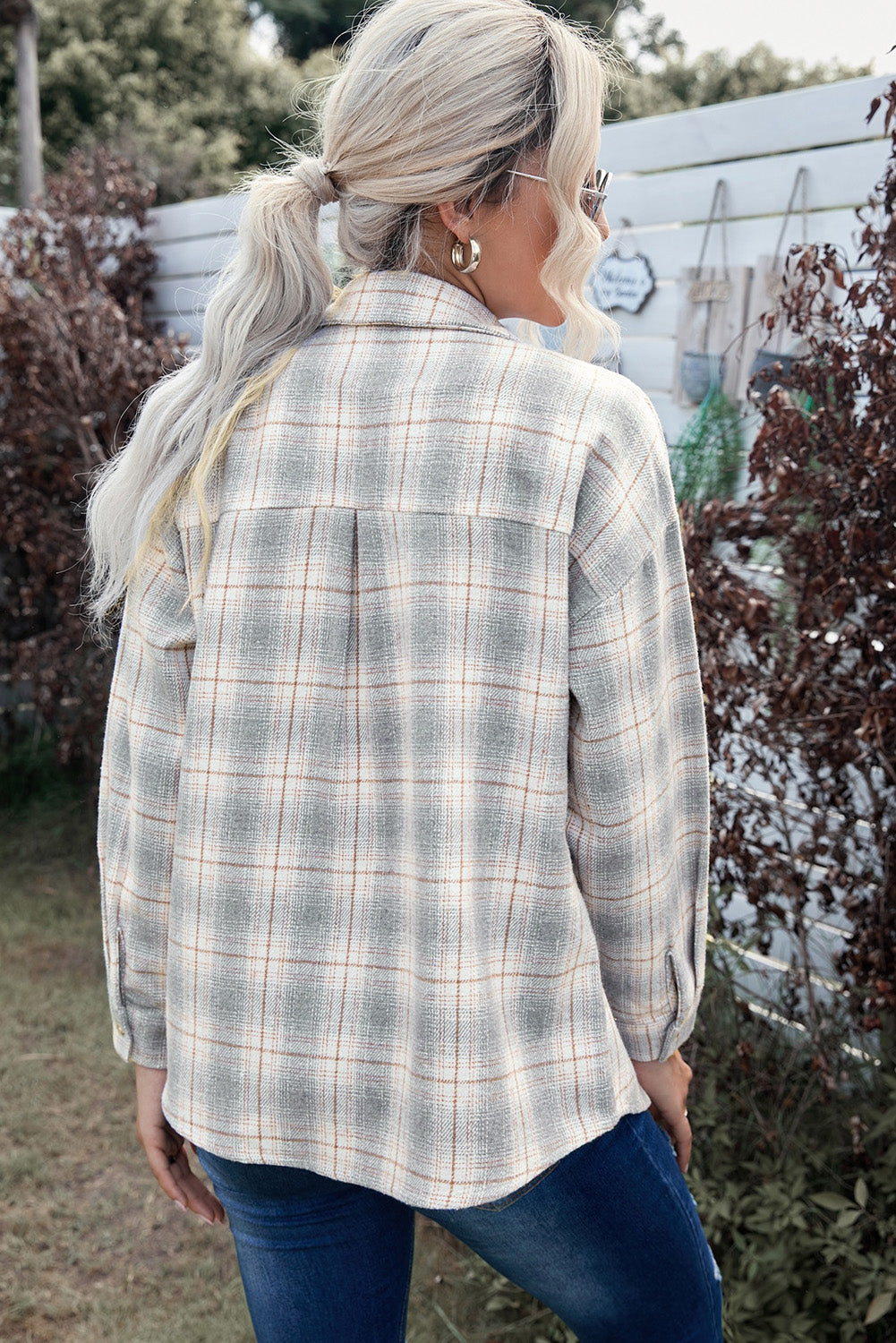 A stylish Buttoned Turn Down Collar Plaid Shirt featuring a slim fit design, classic plaid pattern, and button closure, suitable for ladies and young girls.