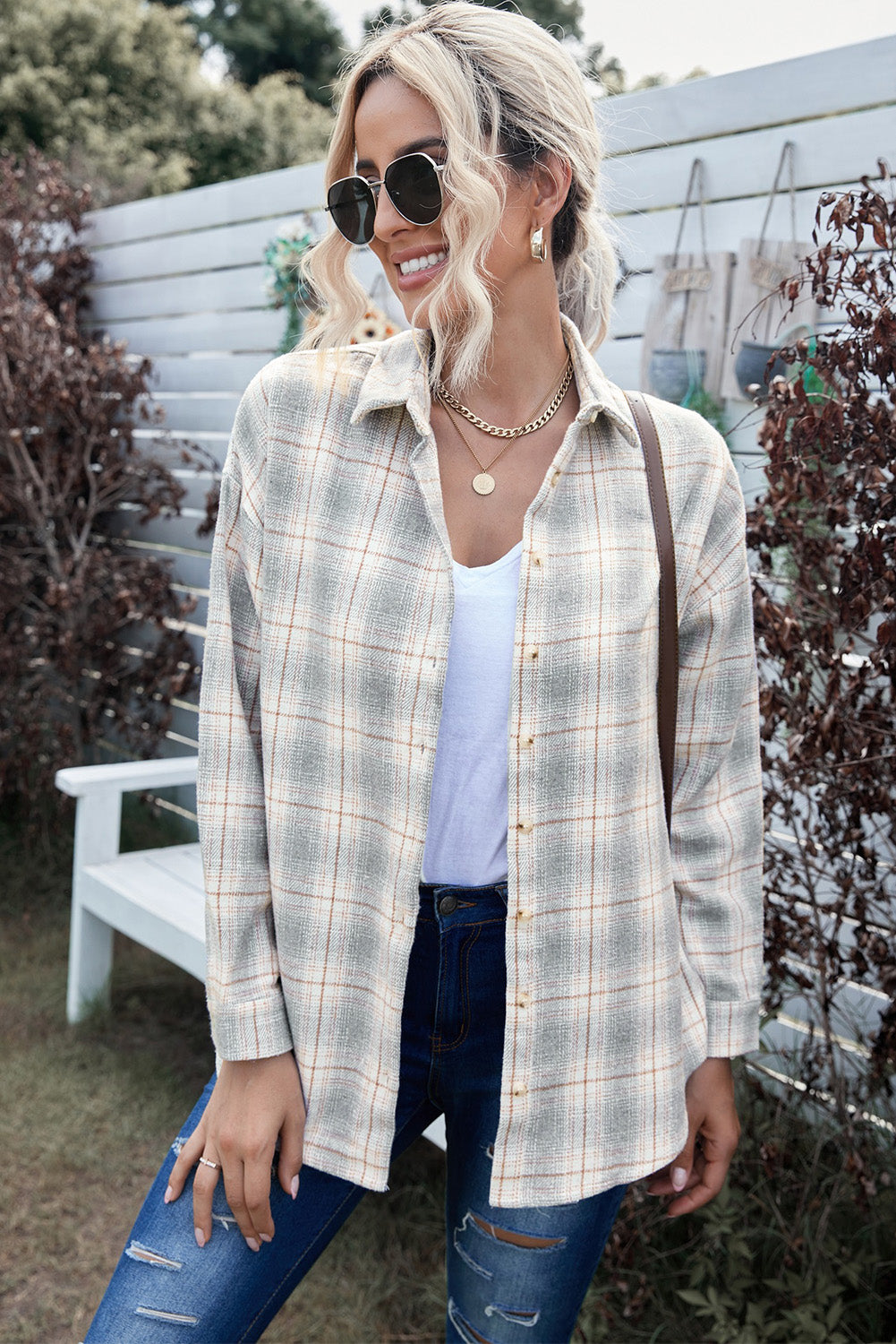 A stylish Buttoned Turn Down Collar Plaid Shirt featuring a slim fit design, classic plaid pattern, and button closure, suitable for ladies and young girls.