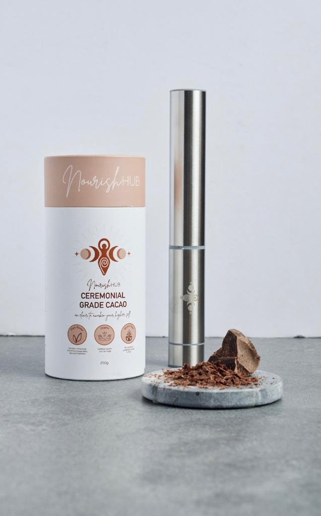 Cacao Ceremony Bundle featuring ceremonial grade cacao cylinder and stainless steel milk frother, perfect for rich, creamy cacao drinks.