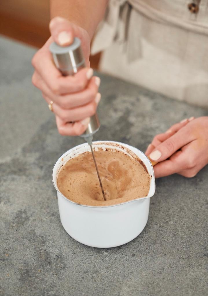 Cacao Ceremony Bundle featuring ceremonial grade cacao cylinder and stainless steel milk frother, perfect for rich, creamy cacao drinks.