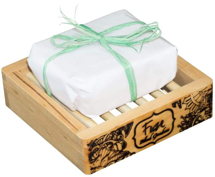 Calm 'Mojito' Burst Bar with wooden soap dish, featuring vibrant colors and organic peppermint leaves.