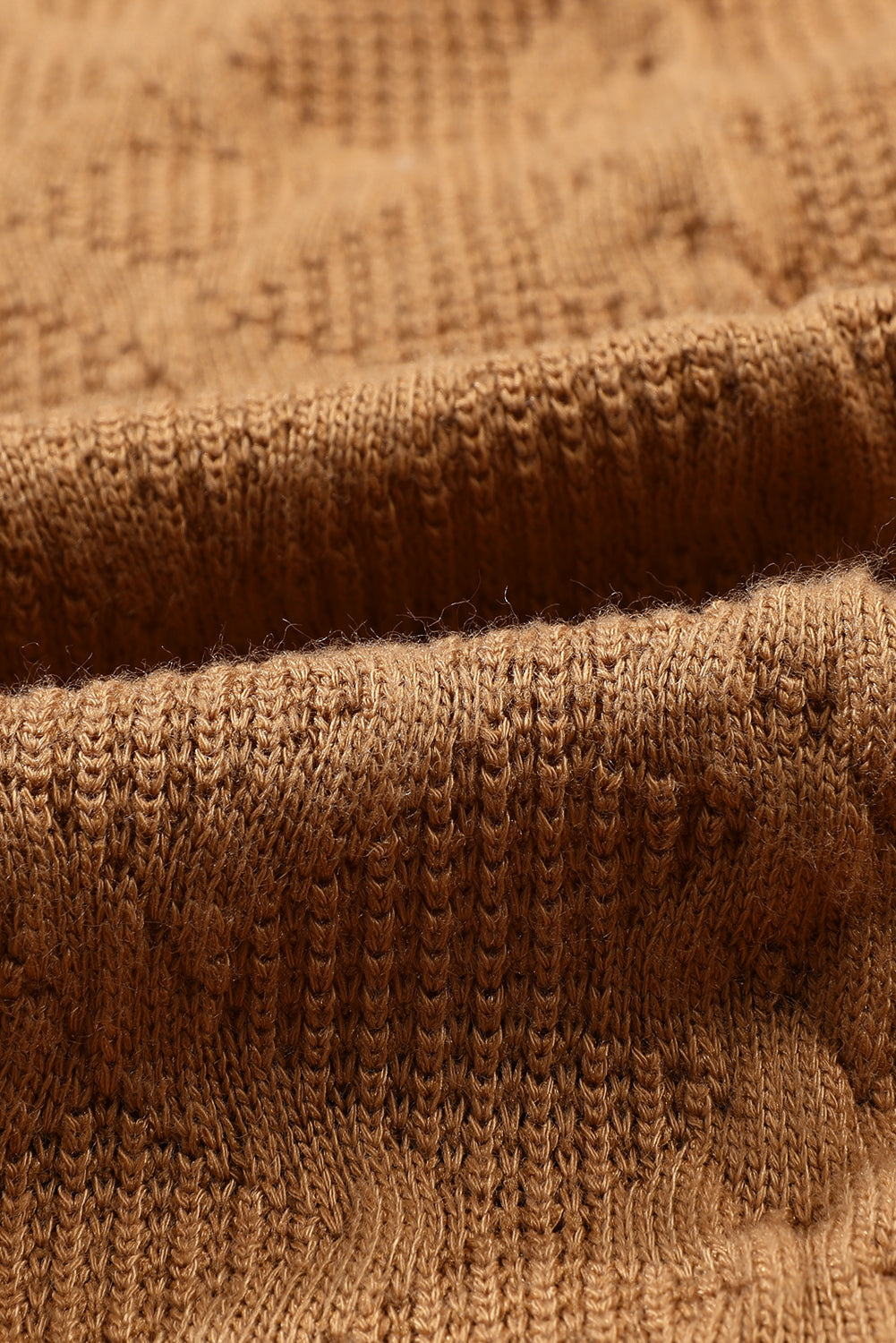 Camel Cable Knit Flap Pocket Shacket featuring a cozy cable knit design and flap pockets, perfect for layering in colder seasons.