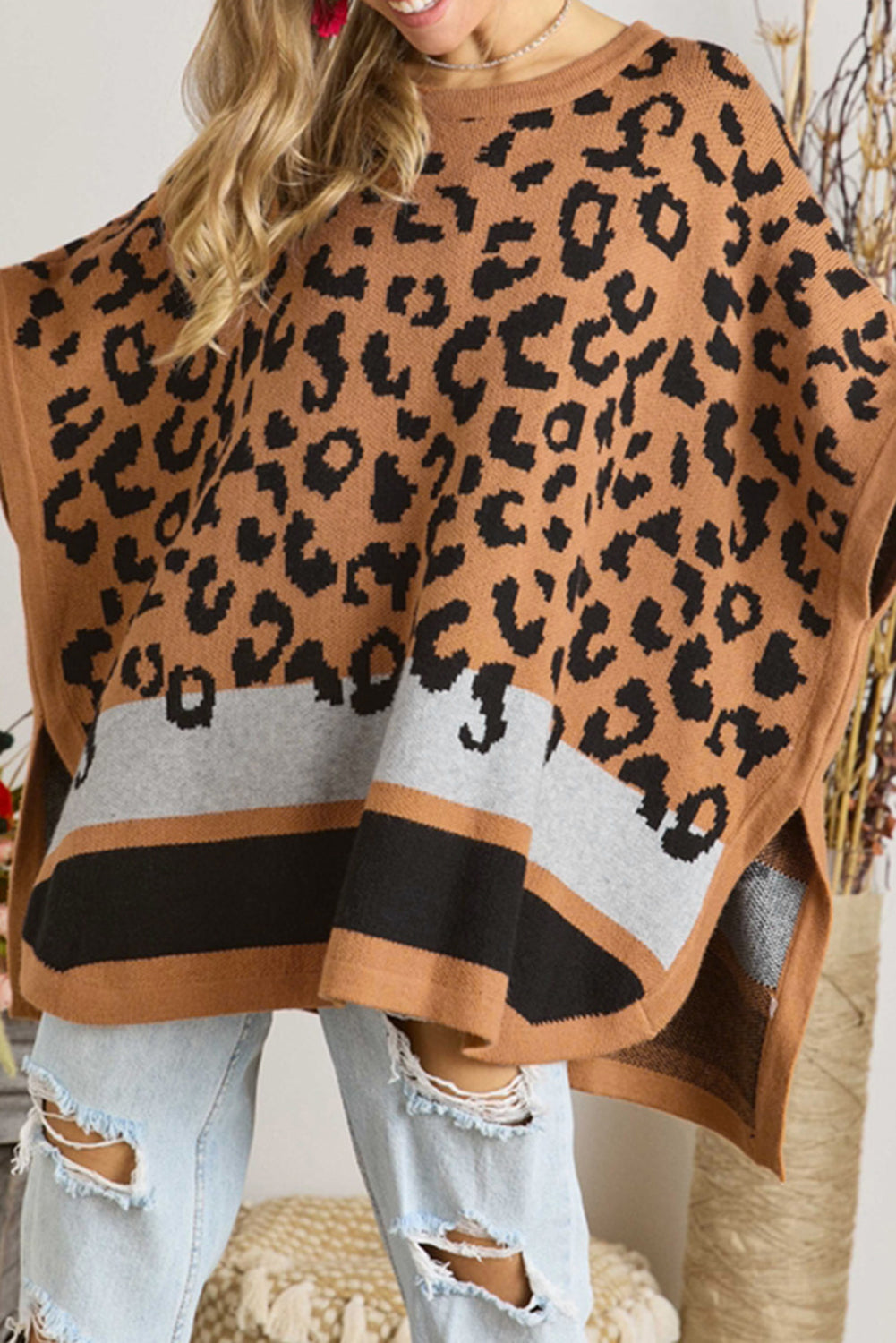 Camel leopard print poncho sweater with oversized fit and kimono sleeves, perfect for stylish cold weather outfits.