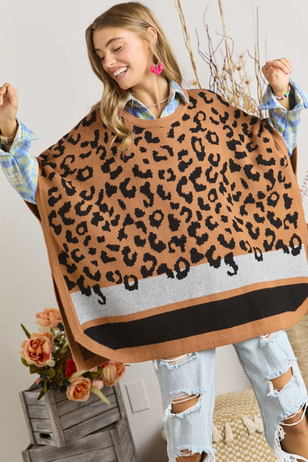 Camel leopard print poncho sweater with oversized fit and kimono sleeves, perfect for stylish cold weather outfits.