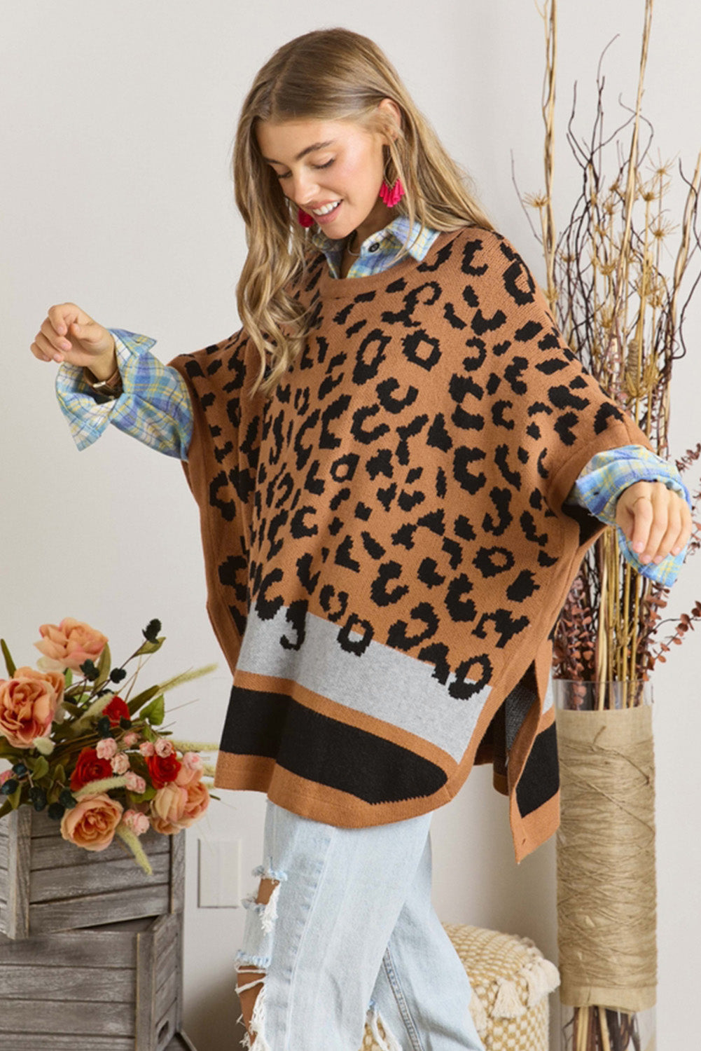 Camel leopard print poncho sweater with oversized fit and kimono sleeves, perfect for stylish cold weather outfits.