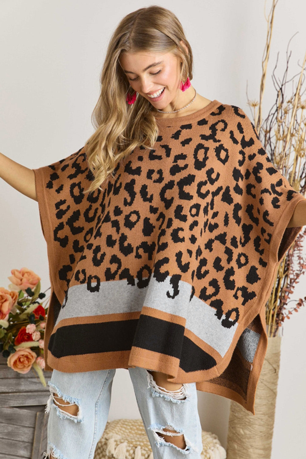 Camel leopard print poncho sweater with oversized fit and kimono sleeves, perfect for stylish cold weather outfits.