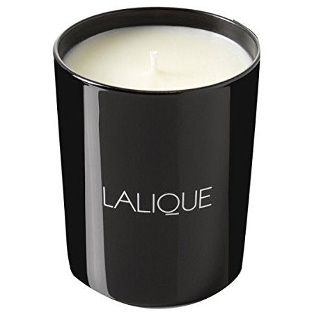 Lalique Candle - Yuzu Shikokou in an elegant glass holder, showcasing its luxurious design and vibrant citrus scent.