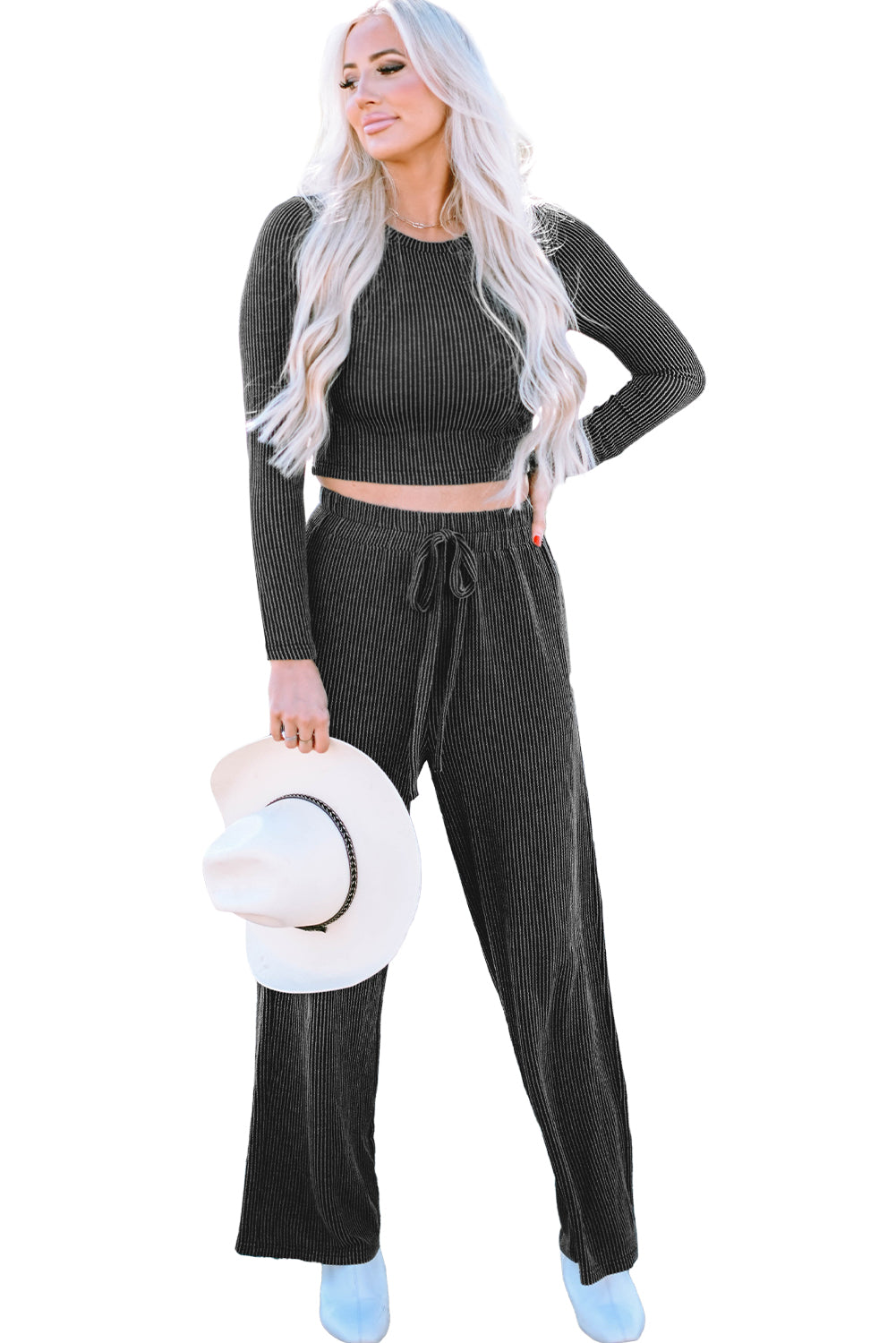 Carbon grey corded long sleeve top and wide leg pants set displayed on a mannequin, showcasing its relaxed fit and stylish design.